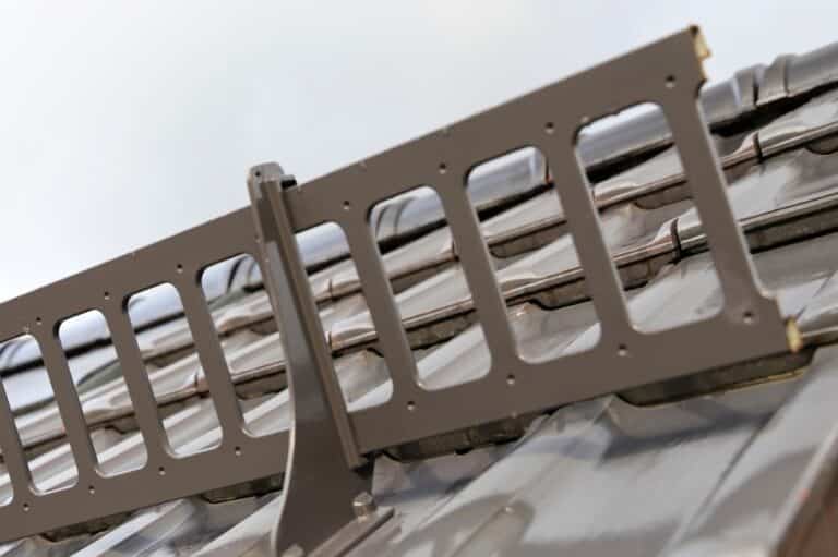 Metal Roof Snow Guards Vs. Snow Rails