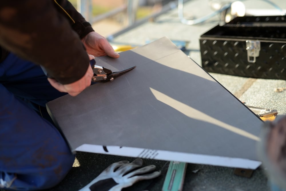 Tin Snip Tools on Metal Roofing