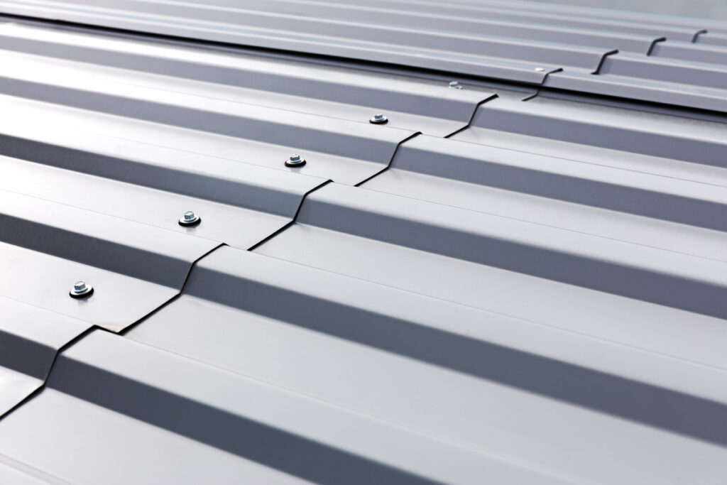 How to Screw Down Metal Roofing